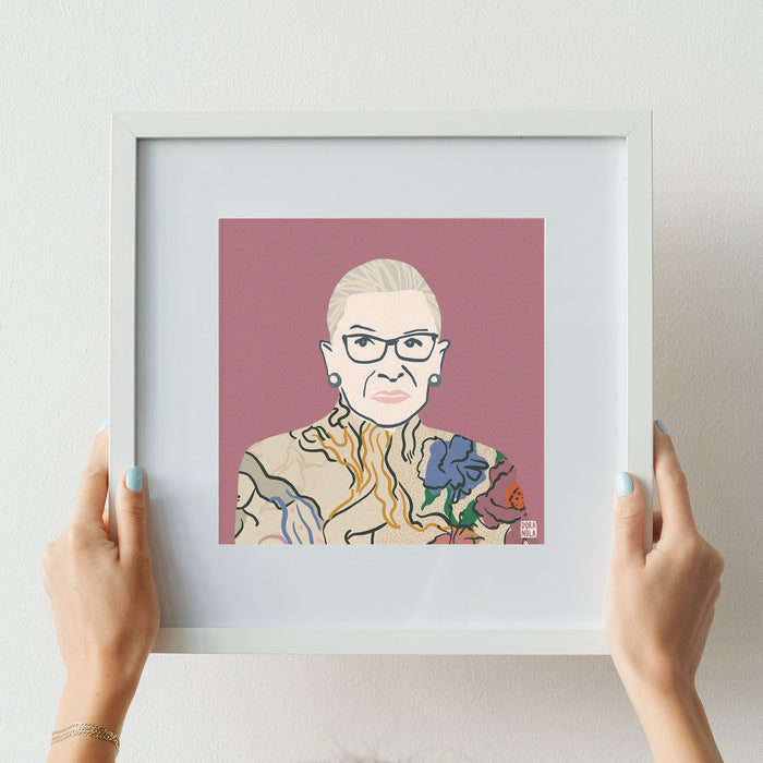 portrait of Ruth Bader Ginsberg in white frame