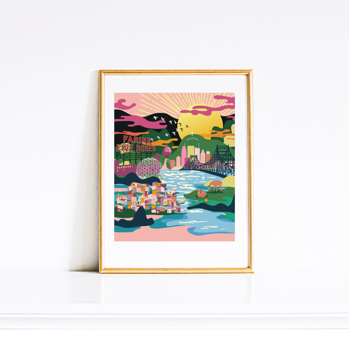 Colorful artwork of a sunset over the city of Montreal, framed in gold on a white wall.