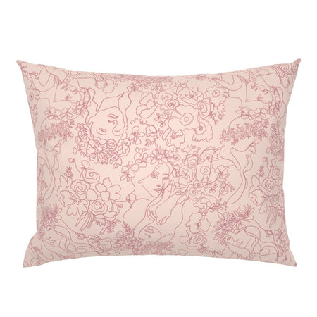 Lacey mulberry silk pillowcase in blush pink with delicate line-drawn feminine faces among roses and florals