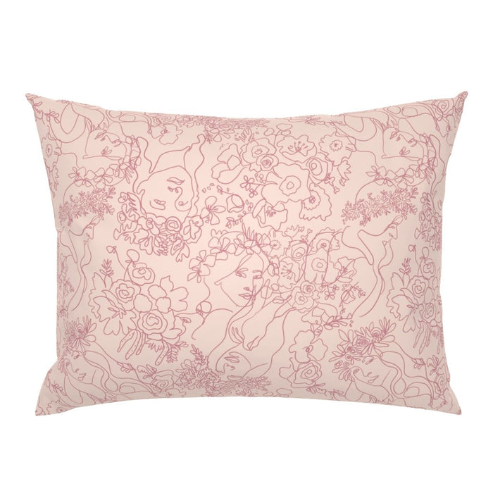 Lacey mulberry silk pillowcase in blush pink with delicate line-drawn feminine faces among roses and florals