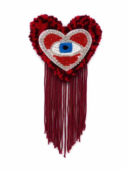 Handmade tufted brooch in deep red with embroidered evil eye centrepiece framed in rhinestones and long burgundy fringe