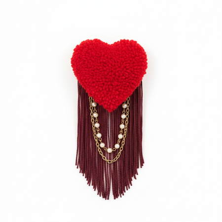Clean product photo of red heart brooch with fringe