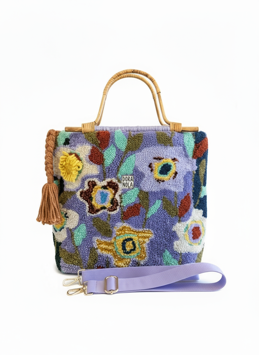 Clean professional product photo of floral tufted bag - no 3D flower