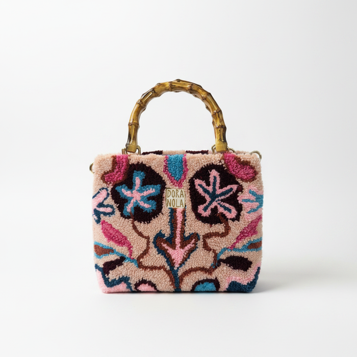 Dora Nola Pink Tufted Bamboo Handle Bag - White Background