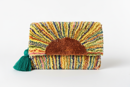 Dora Nola Sunburst Tufted Clutch with Terracotta Sun & Teal Tassel — White Background