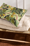 Green botanical silk pillowcase on pillow