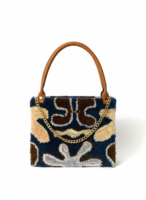 Luxury top handle handbag with leather handles