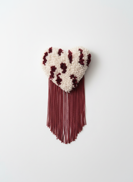 Professional product photo of polka dot heart brooch